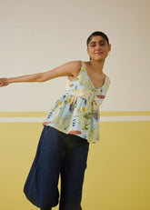 A Model Wearing Multicolor Sunshine Tencel Peplum Top, curated by Only Ethikal